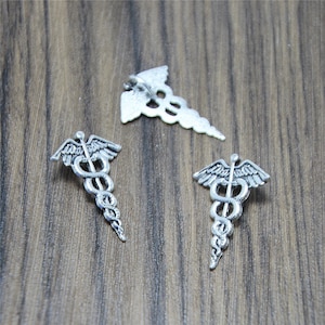 30pcs  silver tone Caduceus Medical Symbol Mercurial Staff with Wings Snakes Charms 30x20mm