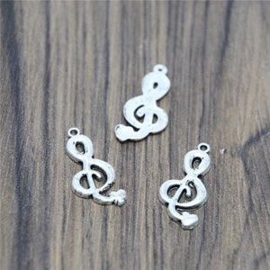 20 stuks muzikale bedels zilverkleurige solsleutel, muziekhangers, hangers 29 x 13 mm
