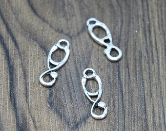15 sztuk zawieszek stetoskopowych w kolorze srebrnym z zawieszkami medycznymi 22 x 8 mm