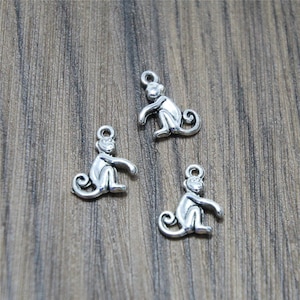 30 dijes de mono plateados: colgantes de aleación de zinc (16 mm x 13 mm)