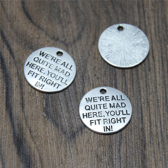 15pcs we are all quite mad here you/'ll fit right in Silver tone charm 20mm