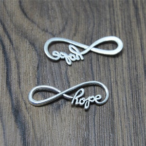 20 antika silverhängen med hopp och oändlighet: 39 x 14 mm