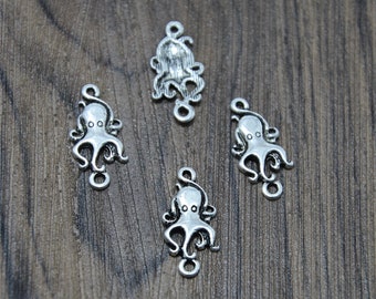 May include: Four silver-toned octopus charms with a loop at the top for attaching to jewelry or other crafts.