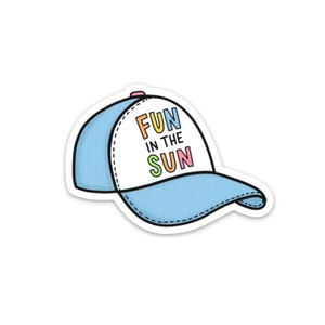 May include: A blue and white baseball cap with a white patch that says "FUN IN THE SUN" in colourful letters.