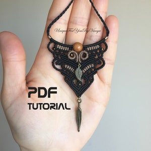 PDF pattern on black and light brawn micro-macrame bohemian necklace with wooden bead at the middle top with two metal leafs charms. One attached at the middle of the necklace and the other at the bottom.