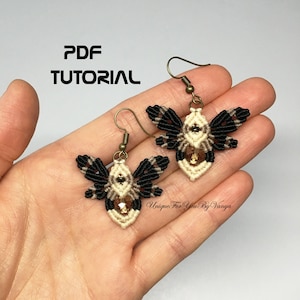 May include: A pair of black, beige, and brown butterfly earrings with crystal accents. The earrings are hanging from a hand. The image includes the text "PDF TUTORIAL".