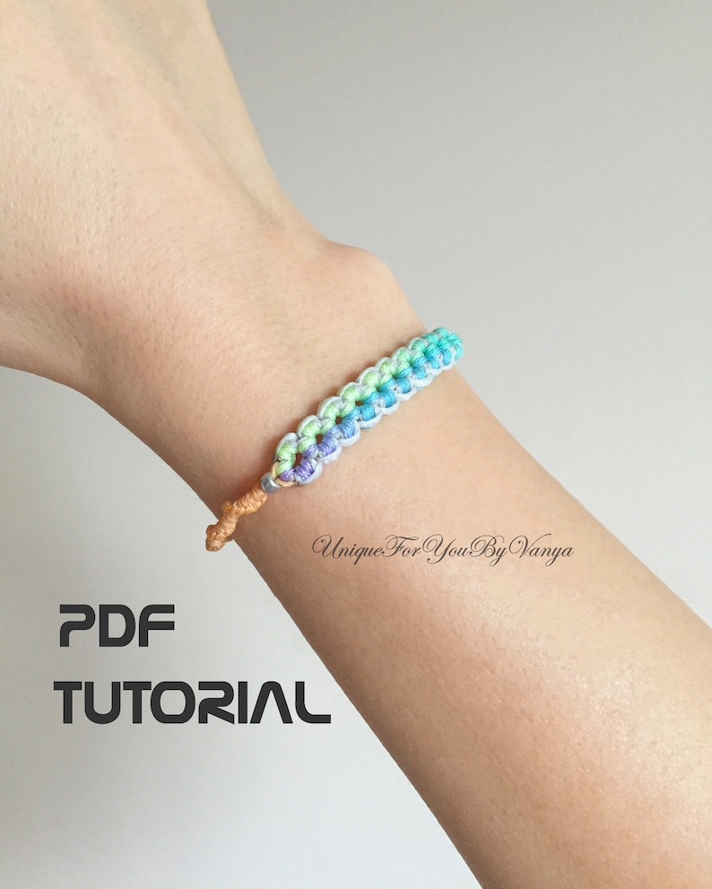 PDF pattern to fine micro-macrame flower shapes bracelet in rainbow color with orange strap.