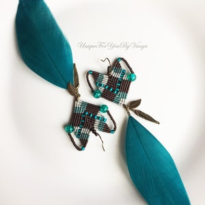 May include: Teal feather earrings with brown and white macrame geometric shapes and turquoise beads.  "Unique For You By Vanya" is written in the image.