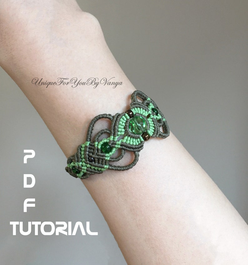 May include: A green and brown macrame bracelet with green glass beads. The bracelet is on a person's wrist. The text "PDF TUTORIAL" is below the bracelet.