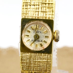 Vintage und sehr ungewöhnliche Pedre Gold Tone Damen Schweizer Armbanduhr 17 Jewels Wind Up Runs Gold Ton Florentiner Armband