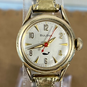 Vintage 1970s Bulova Sea King Armbanduhr: 10K Gelbgold gefüllt, Wal-Motiv