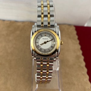 Vintage Sculptured Accutron Bulova T3 Watch 2 Tone Gold and Stainless steel case Swiss made Ladies