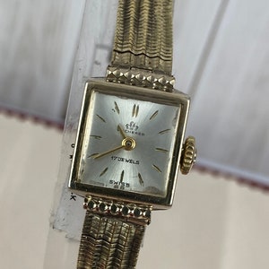 Vintage Exciting 1960's Bucherer Ladies Hand Wind Mechanical Wrist Watch Gold Plated, 1/2 by 5/8 Rectangular Shape Face