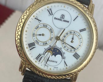 Orologio vintage Daniel Mink con fasi lunari: quadrante celeste placcato oro