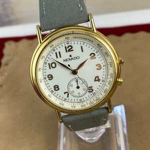 Vintage Movado Watch 1980's mans 1 5/16 inch Diameter Case 20 Microns of 18K Gold Plating Stainless Steel Back, 9 In Gray Leather Strap