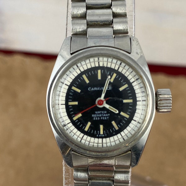Vintage Caravelle P1 Swiss Black and White dial Dial Silver Tone Base Metal Bezel, Stainless Steel Screw down Back