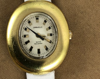 Vintage Caravelle Gold Tone 1950's Mechanical Hand Wind Watch 8 inch White Leather Strap 7 Jewel W.German Movement