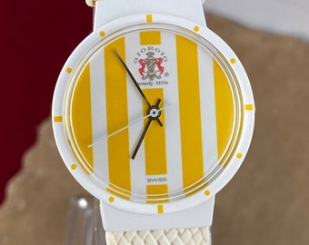 Reloj suizo vintage Giorgio Beverly Hills: amarillo y blanco, nuevo de antiguo stock.