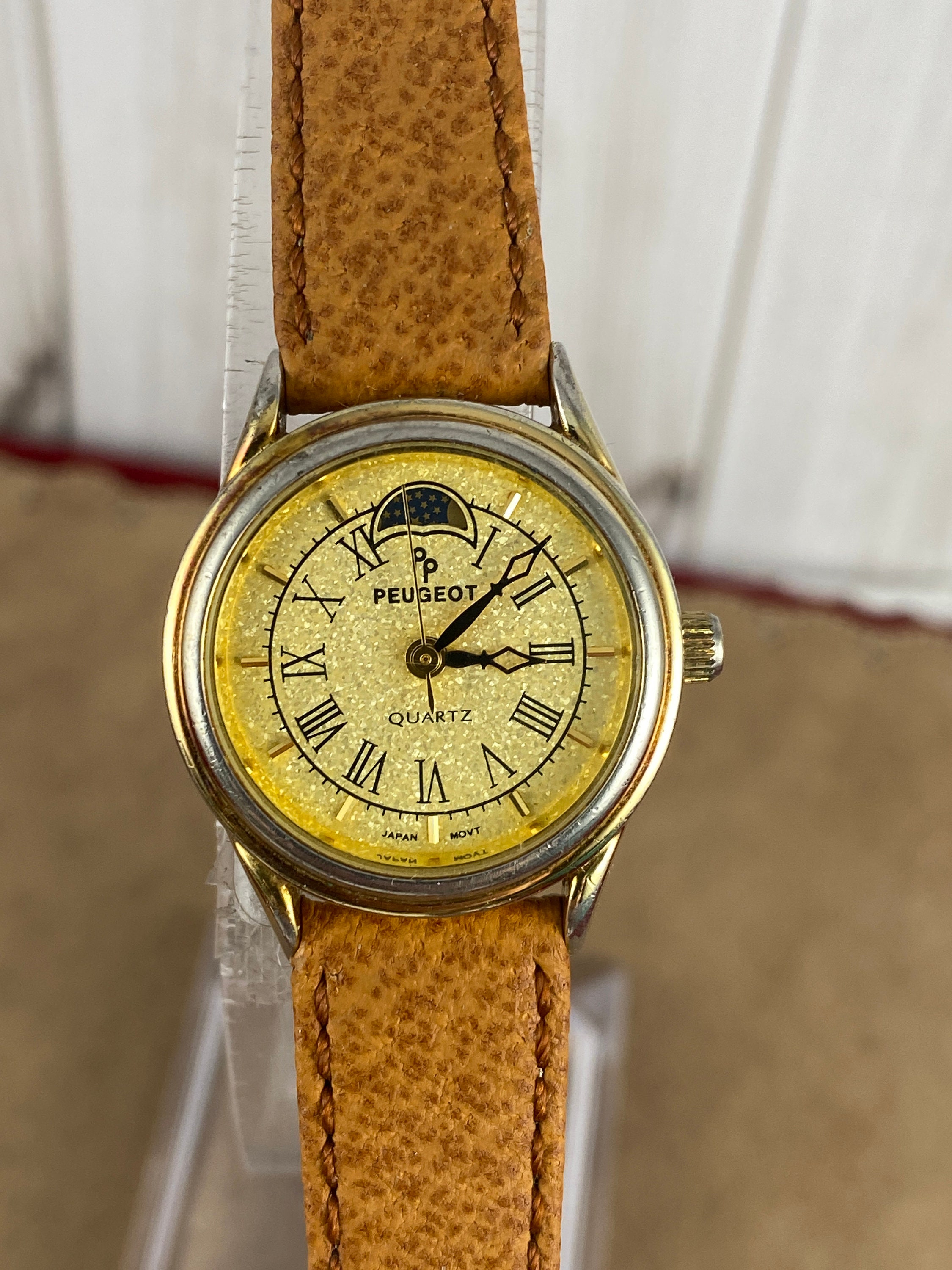 Peugeot moon phase watch hot sale
