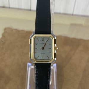 Vintage 1990's Bucherer Watch with Platinum Color dial with Gold markers Gold hands.18K Gold 10 Micron Plated, Black  8 inch Strap & Buckel