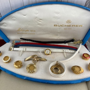 Vintage Swiss Bucherer Interchangeable Windup Ladies Watch 10 Micron 18 Karat Gold Plated with 6 LeatherBands 6 Bezels, Pendant and brooch