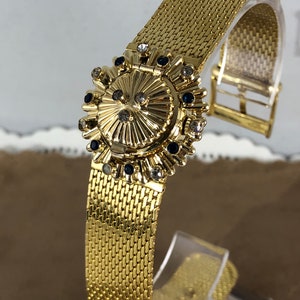 Vintage Bucherer Peek a Boo Jewel Armbanduhr mit künstlichen Saphiren, 20 Mikron vergoldete Ebel 17 Jewels Mechanisches Uhrwerk