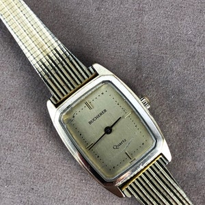 Vintage Bucherer Quartz Watch: 18K Gold Plated Tank Style