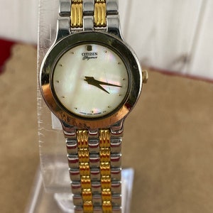 Vintage Citizen Watch with Beautiful Mother of Pearl Pearlescent Face Gold Hands 2 tone Silver and Gold Tone Bracelet