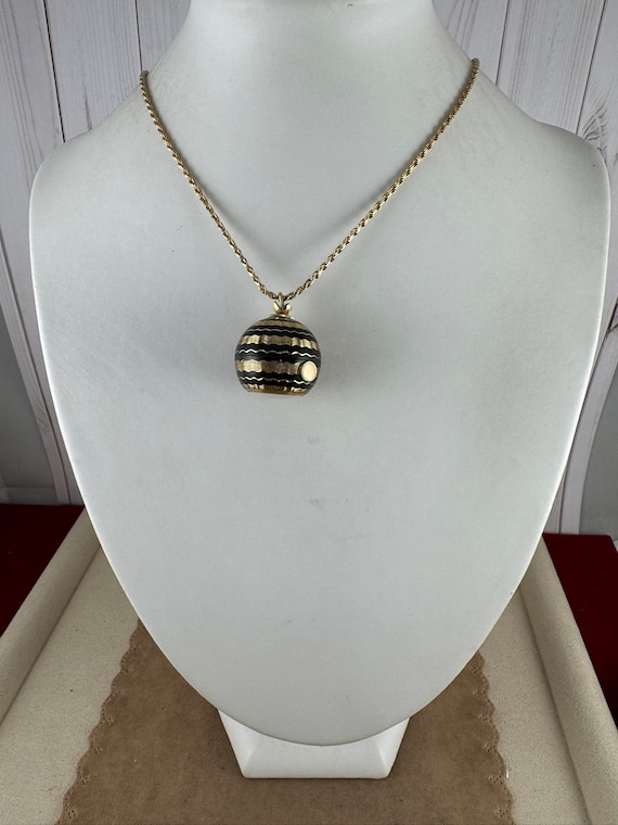 Caravelle by Bulova 1960s Black Gold
Tone Enamel Ball Pendant Watch
Necklace Vtg 60s Caravelle Swiss Gold Tone Black Enamel Ball Orb  main image 2