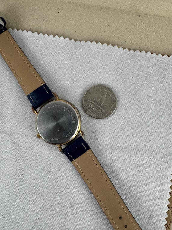 Vintage Quintel Moon Phase Watch: Rotating Celestial Dial  display picture 2