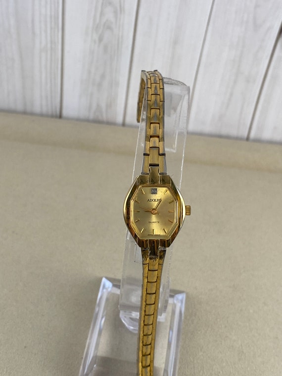 Adolfo diamond deals quartz watch