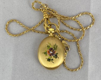 Swiss Made Vintage Bucherer Watch 1.5x0.75 inch inch Oval Case Beautiful Pansy Flower pattern on reverse Mineral Crystal