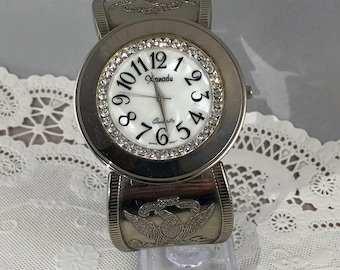 Vintage Xanadu Crystal Bezel Watch: Mother of Pearl Dial, Stainless Steel