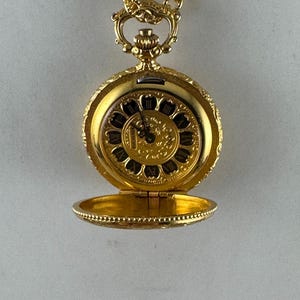 Vintage Bucherer Swiss Pendant Watch: Gold Plated Roman Numeral Necklace