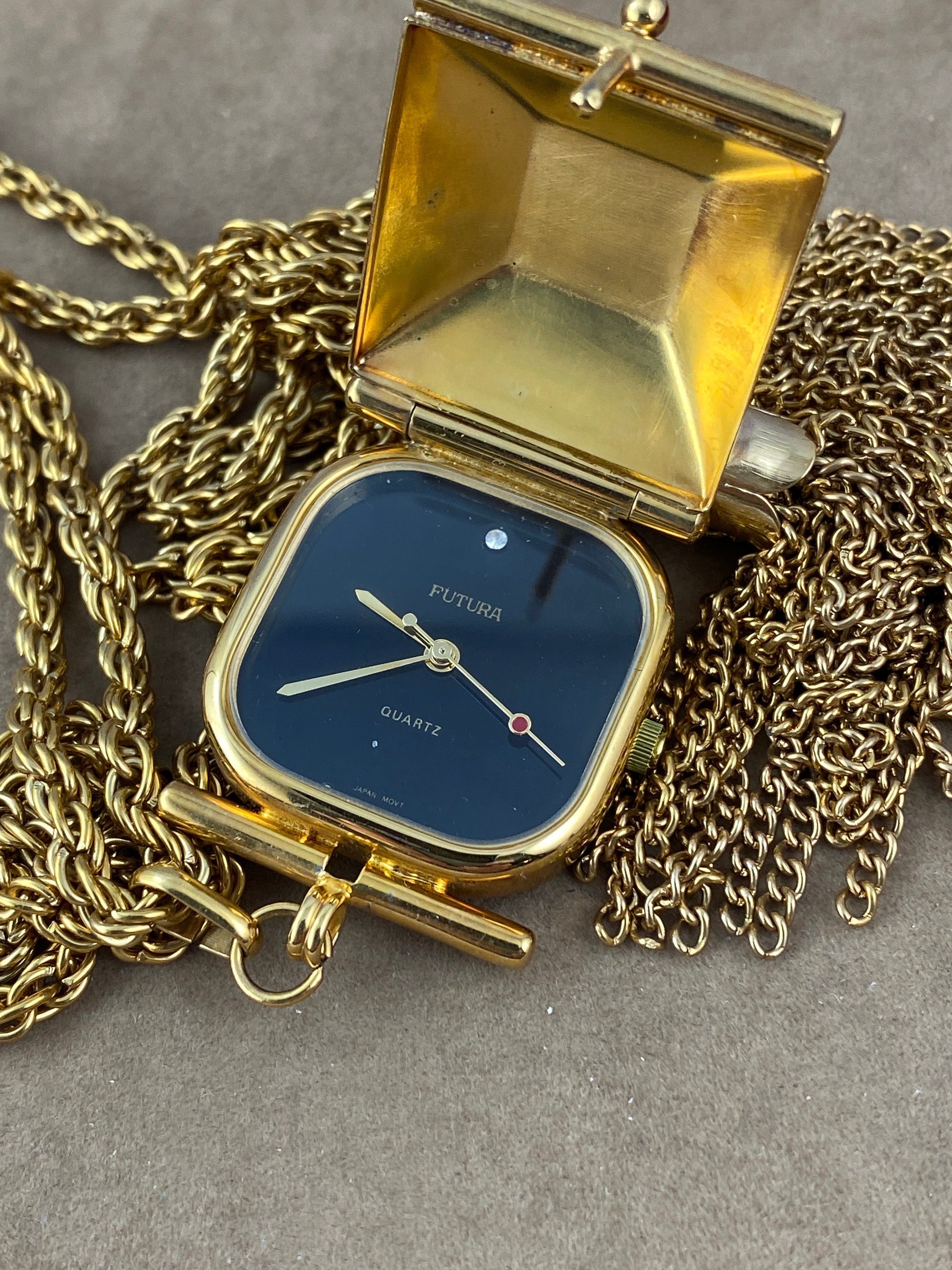 Futura watch best sale necklace