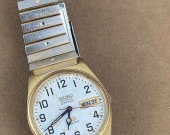 〇Nc左1045 昭和レトロ SEIKO QUARTZ DM303E オレンジ 〇Nc左1045 昭和レトロ SEIKO QUARTZ DM303E オレンジ