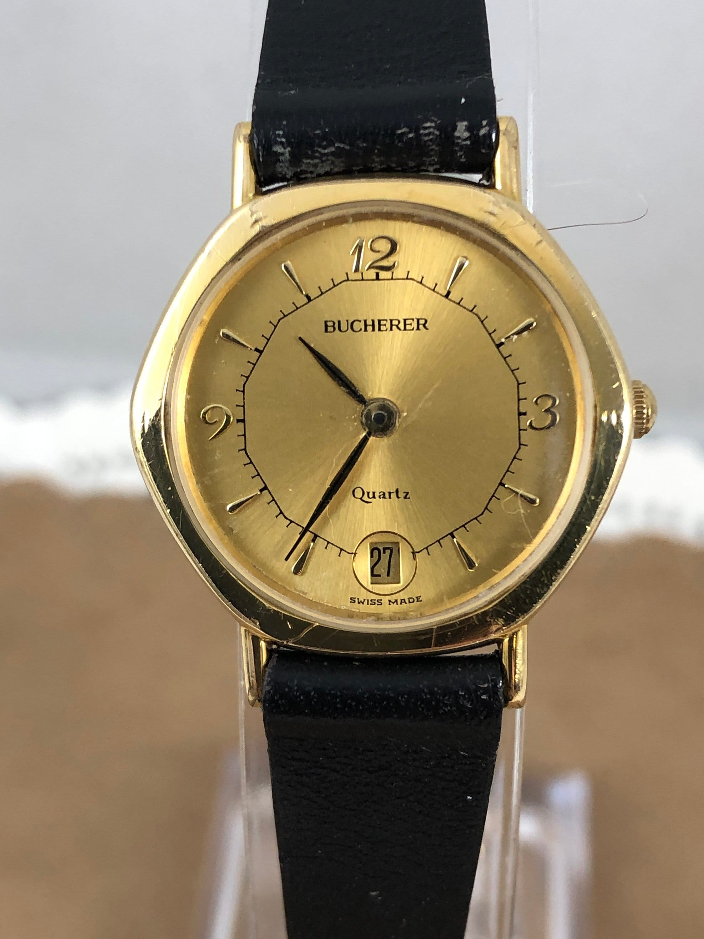 Orologio da polso Bucherer vintage del 1970 con data oro | Etsy Italia