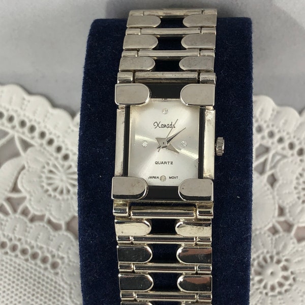 Vintage Ladies Xanadu Silver tone Square shape Face with Black outline quartz watch