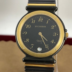 Vintage Bucherer Swiss Watch: Gold on Black, Stainless Steel