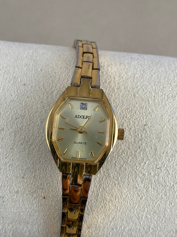 Adolfo diamond deals quartz watch