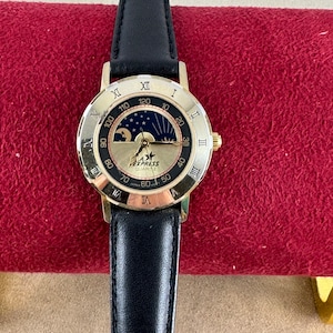 Vintage LA Express Gold tone moonphase watch with Roman Numerals image 1