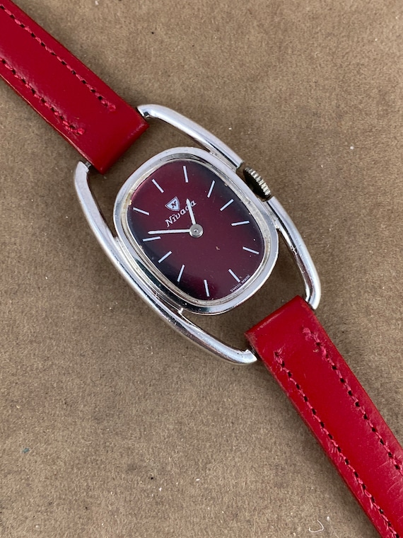 Vintage Nivada Swiss Made Ladies Watch: Red Metallic Face 