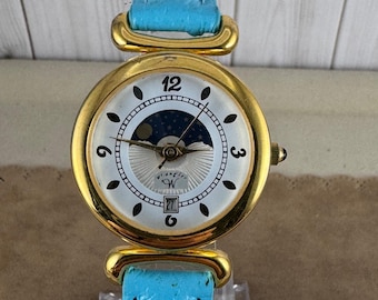 Vintage Wrangler Quartz Fancy Moon Phase Wrist Watch with a 9 inch Blue Leather Strap