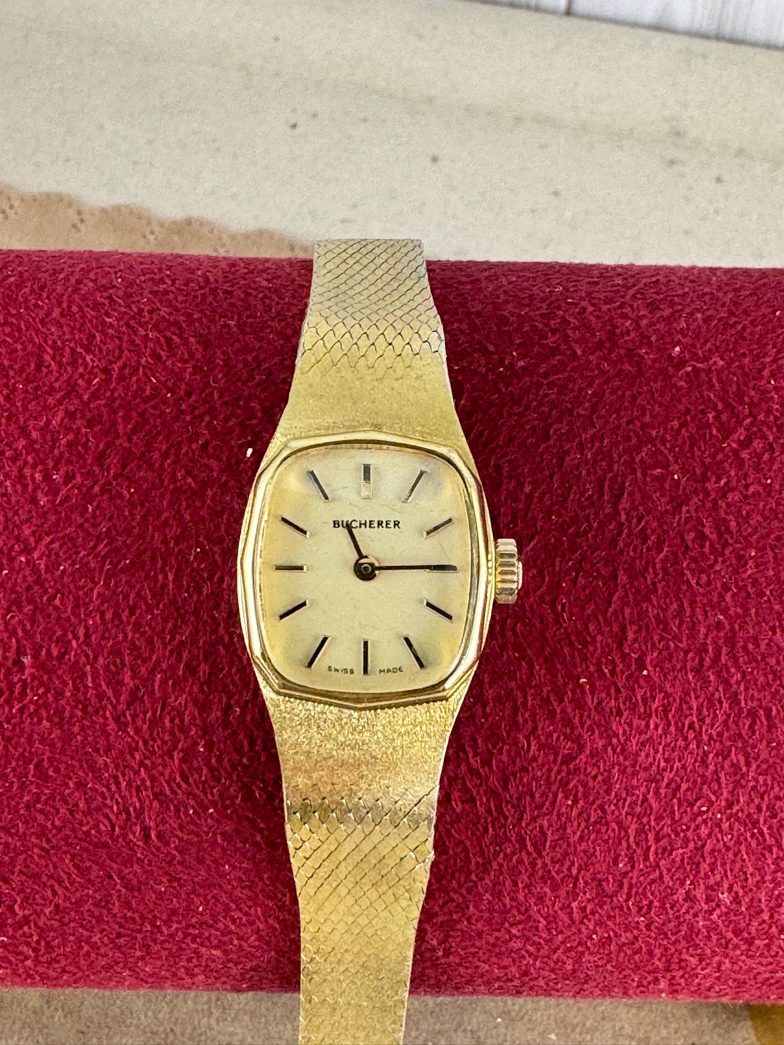 Movado Zenith Ladies Watch 14k Yellow Gold Woven Mesh Bracelet, Lapis Dial.