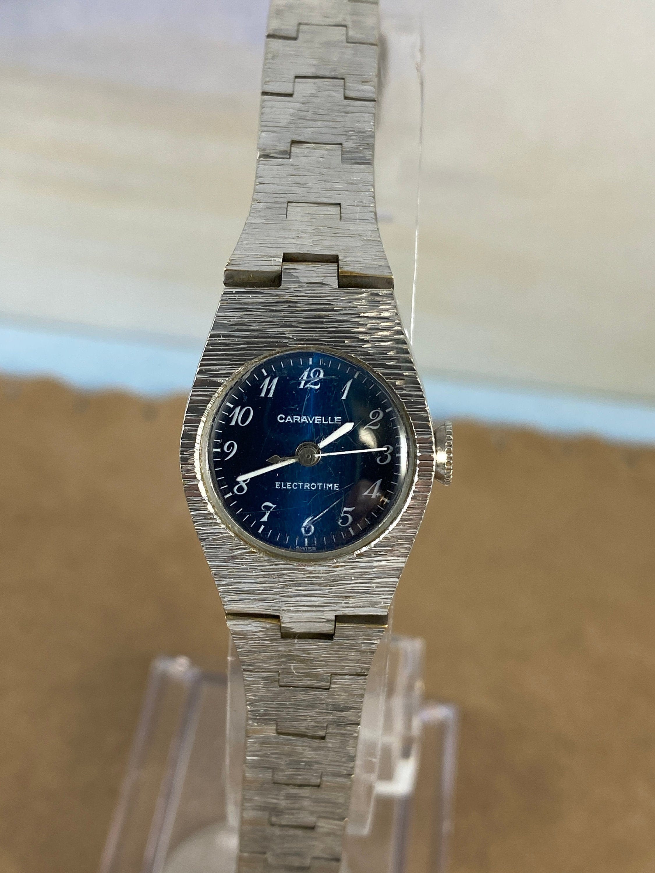 Vintage Caravelle Electrotime Swiss Blue Dial Silver Tone Base Metal Bezel, Stainless Steel Back, Working 1970's See pictures
