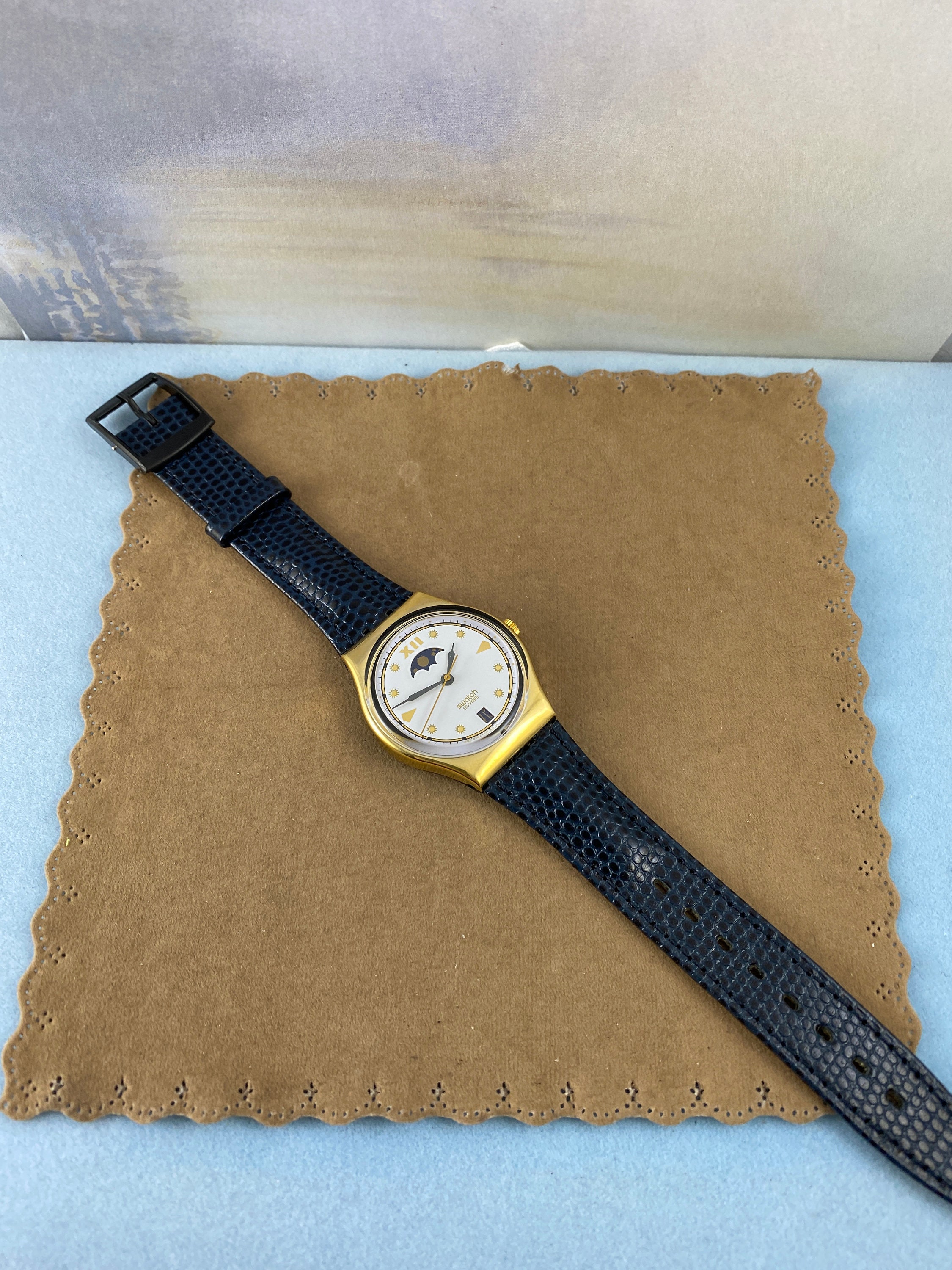 Rare Vintage Swatch Watch Moon Phase, Gold Plated Front Black Plastic Reverse Vintage Swatch Watch: Gold Moon Phase, Navy Strap, New in  main image 3