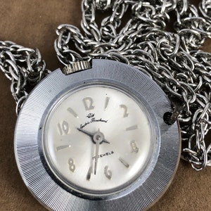 Vintage André Rivalle 17 Jewels Swiss-made wind up Mechanical Watch with 24 inch silver tone necklace
