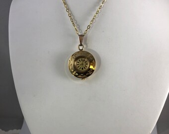 Vintage Caravelle Gold Tone Pendant Watch: Floral Brocade 