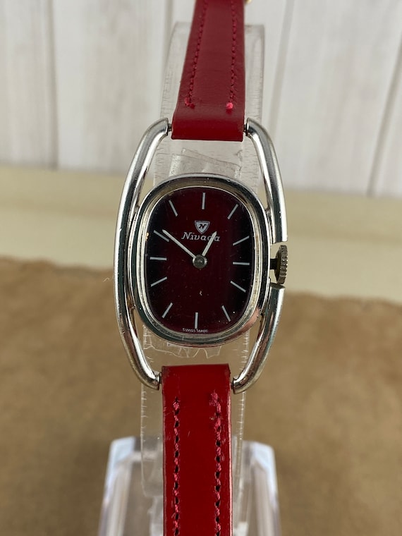 Vintage Nivada Swiss Made Ladies Watch: Red Metallic Face  display picture 3