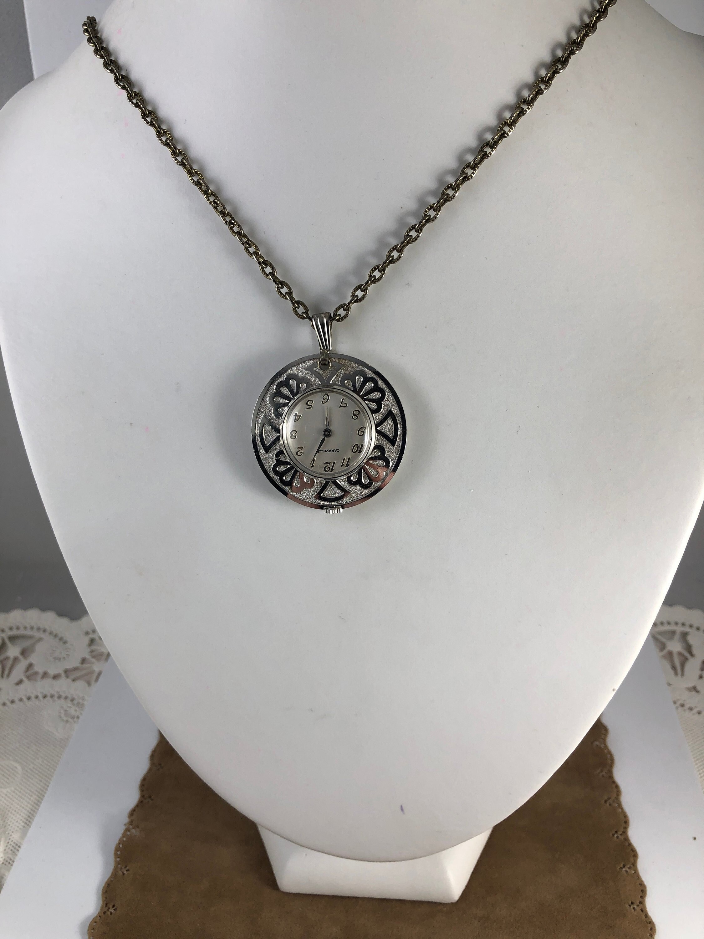 Vintage Caravelle 17 Jewel Silver Tone Pendant Watch in Almost New Condition Brocaded Front Floral Design Mechanical Hand Wind Watch
